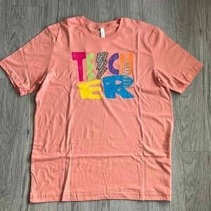 Teach Coral Graphic Tee